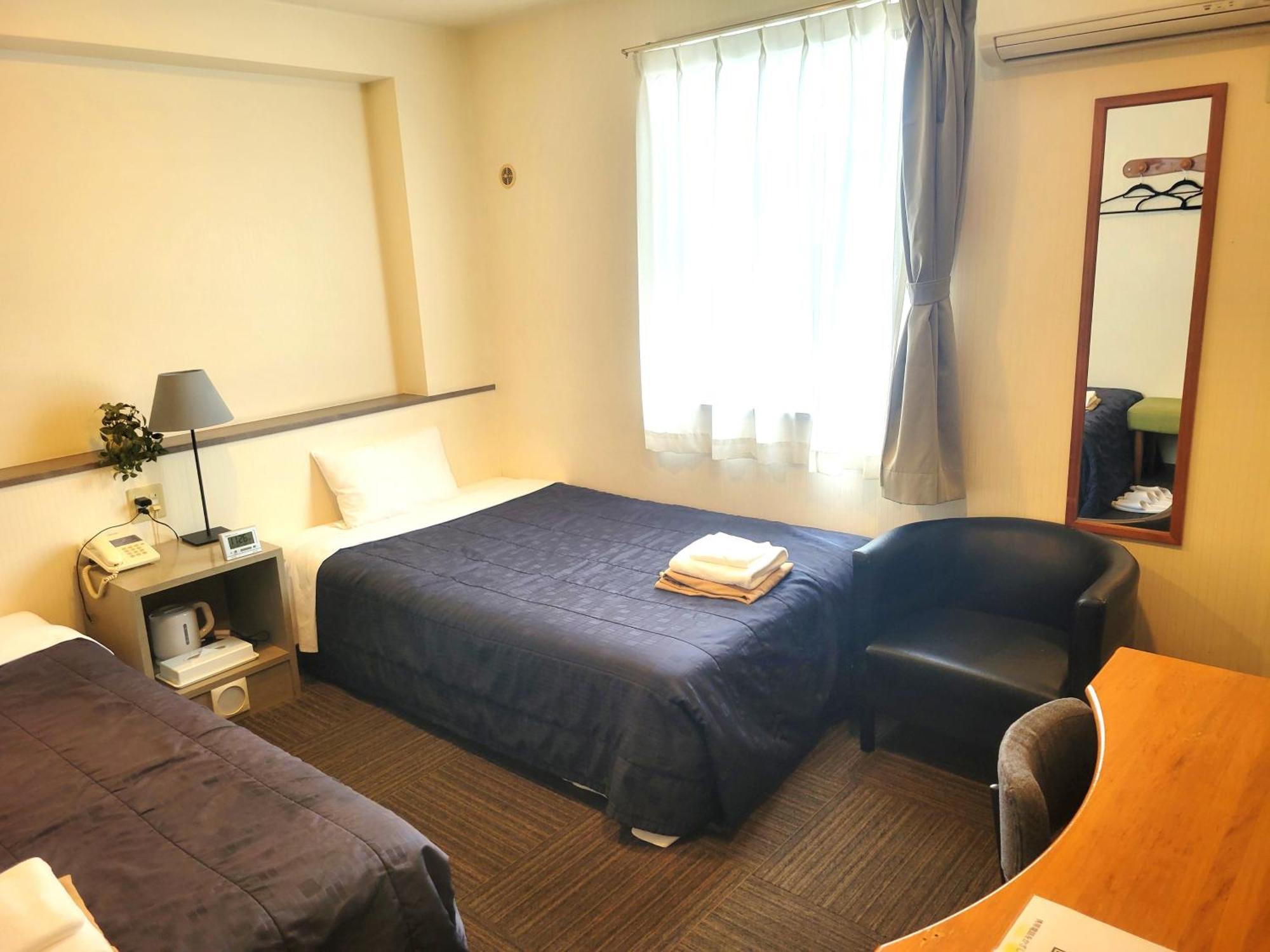 Saga City Hotel Habitación foto